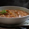 Hearty Barley Soup with Sausages and Sour Cream